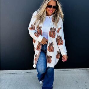 Cozy White Cardigan with Pumpkin Design
